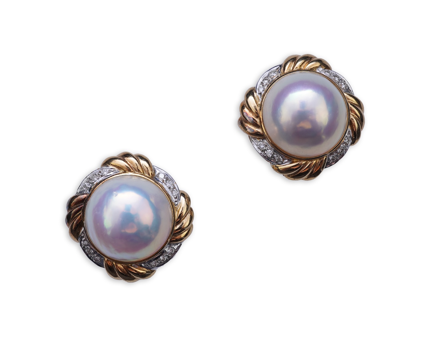 A pair of mabé cultured pearl and diamond earrings